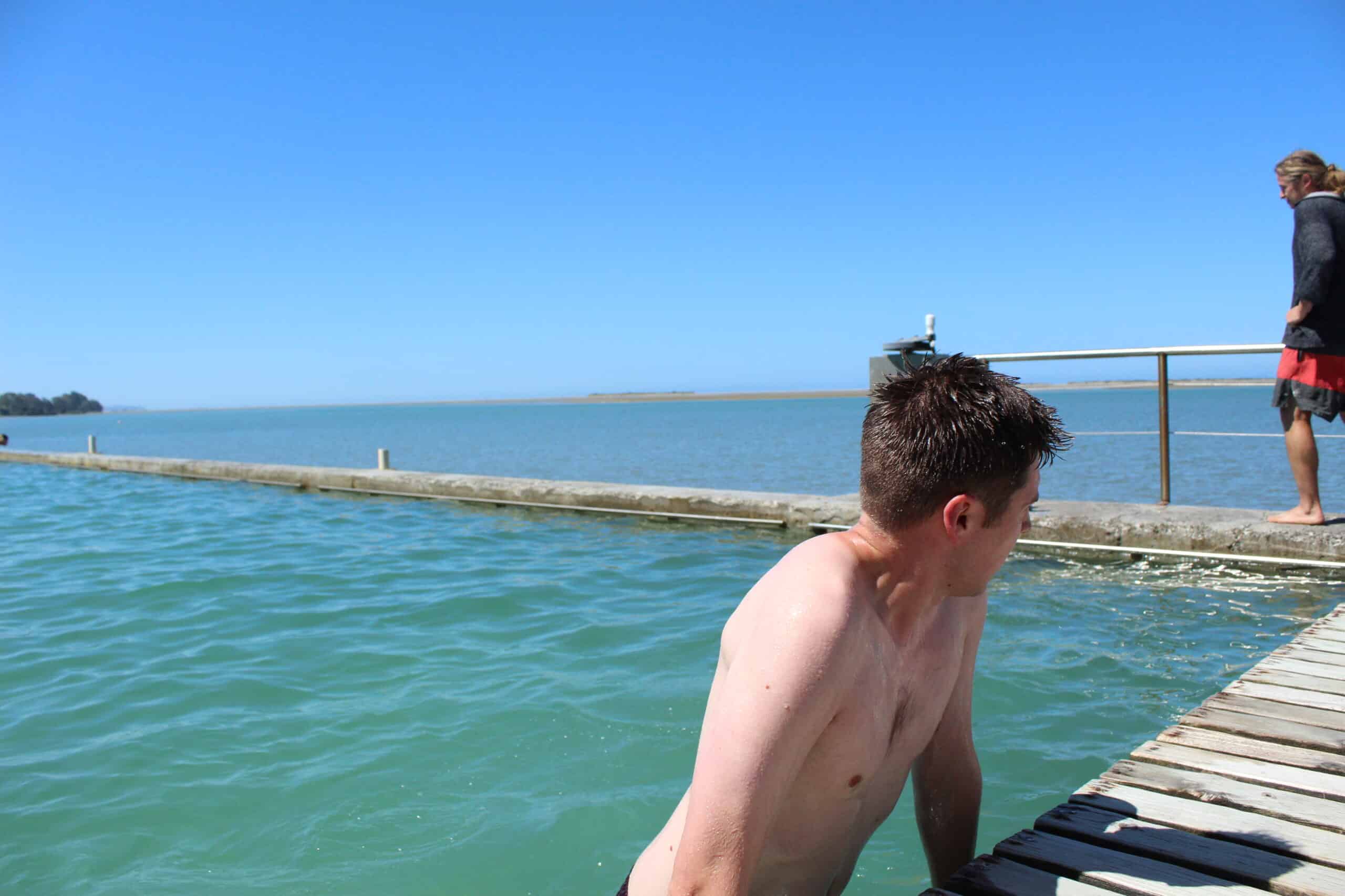 Sam getting out of the motueka salt pools - abel tasman trips