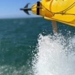 Abel Tasman Trips - kayak boat splash