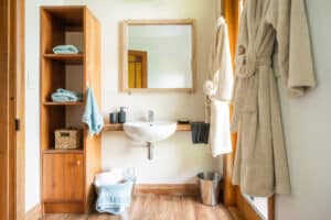 The Abel Tasman beach Bach bathroom at The Barn cabins and camping
