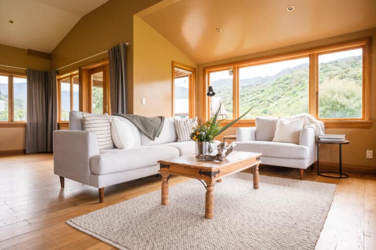 The living room at the beach bach for the barn cabins and camp